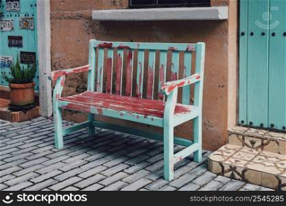 Old chair in outdoor and front of house wall background