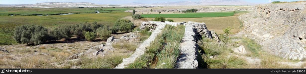 Old channel and panorama of farmland, Turkey