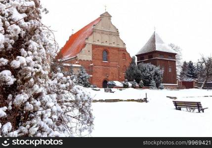 Old Church of St. Wojciech on a snowy day. Poznan. Poland.. Poznan. Church of St. Wojciech on a snowy day.