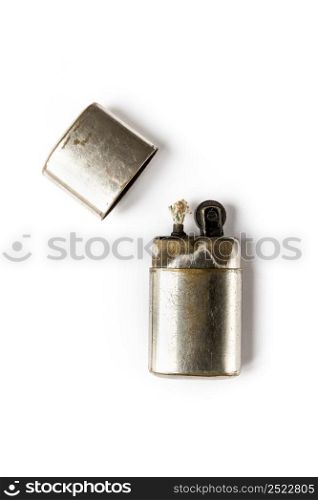 Old classic vintage lighter isolated on a white background. Old vintage lighter isolated on a white background