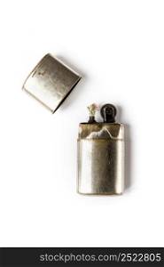Old classic vintage lighter isolated on a white background. Old vintage lighter isolated on a white background