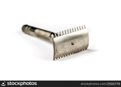 Old classic vintage shaver razor isolated on a white background. Old vintage shaver isolated on a white background