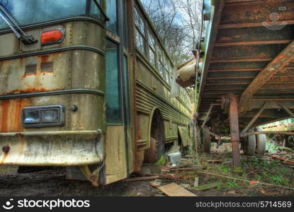 Old coach and trailer at scrapyard, Worcestershire, England.