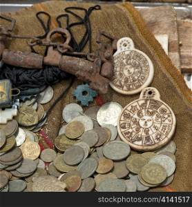 Old coins at a store, Chinchero, Sacred Valley, Cusco Region, Peru