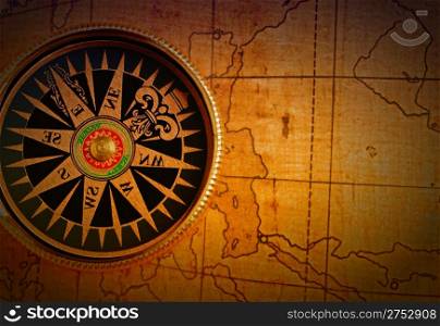 Old compass and map background. Old gold color