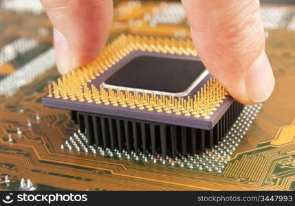 old computer chip processor in the hand