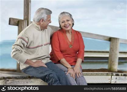 Old couple sitting together