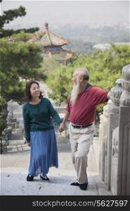 Old Couple Walking In Jing Shan Park