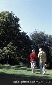 Old Couple Walking Outside Together
