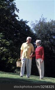 Old Couple Walking Outside Together