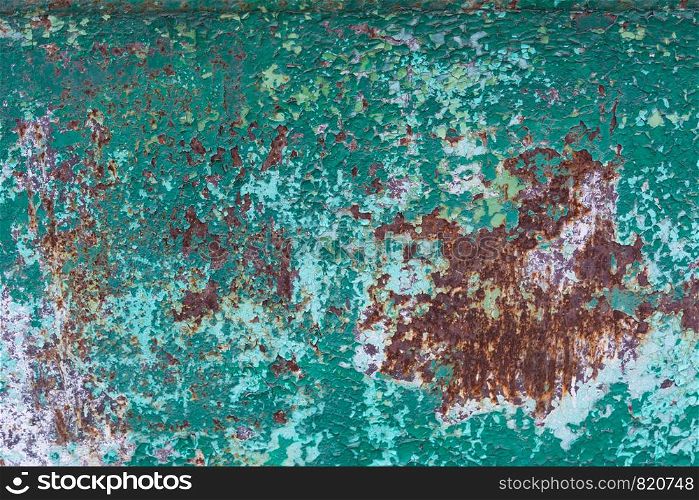 Old cracked green paint and rusted metal background. Grunge texture template for overlay artwork.