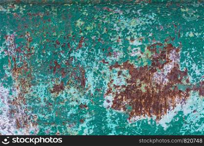 Old cracked green paint and rusted metal background. Grunge texture template for overlay artwork.