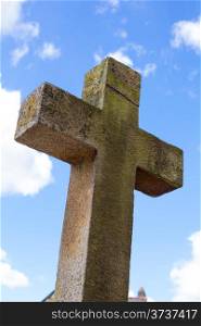 Old cross in a cemetery in France