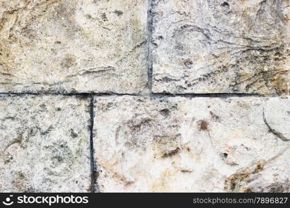 old decorative wall stucco texture at sun light