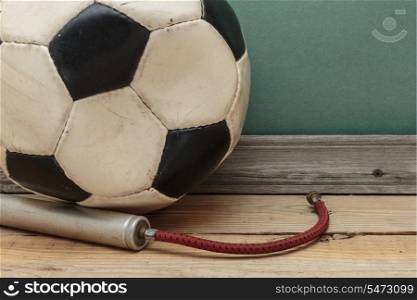 old deflated soccer ball