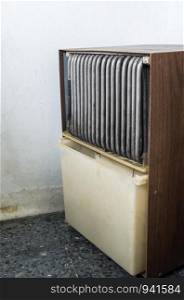 old dehumidifier is located near the corner of the film storage for reduce the moisture in the air.