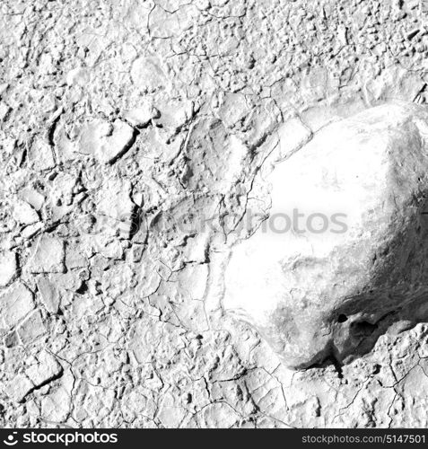 old desert and the abstract cracked sand texture in oman rub al khali