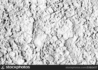 old desert and the abstract cracked sand texture in oman rub al khali