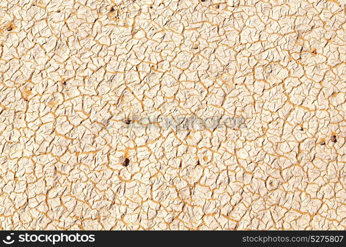 old desert and the abstract cracked sand texture in oman rub al khali