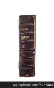 "Old Dutch Bible standing upright on an isolated white background with the back of the book and the words "Die Bibel" clearly visible."