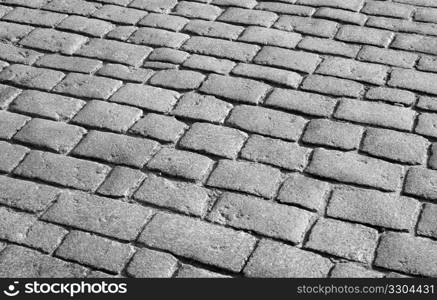 Old English cobblestone road close up.