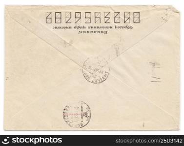 "Old envelope, with cut off on side, with meter stamp, isolated. Russian inscription: "Attention! Sample of filling zip-code" and "Manufactred""