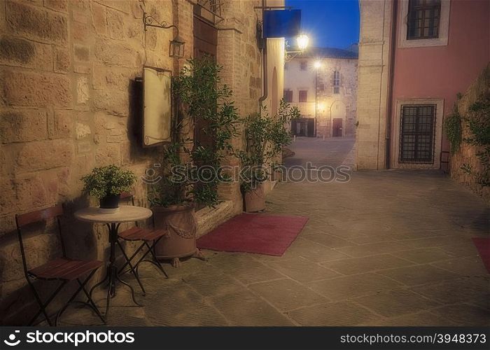 Old european city at twilight. Tuscany, Italy