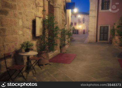 Old european city at twilight. Tuscany, Italy