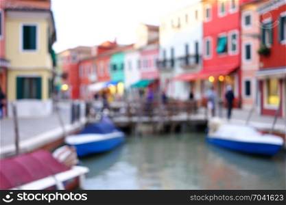 Old European city Burano blur background. Out of focus city view