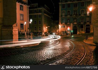 Old European city street at night, Lisbon, Portugal