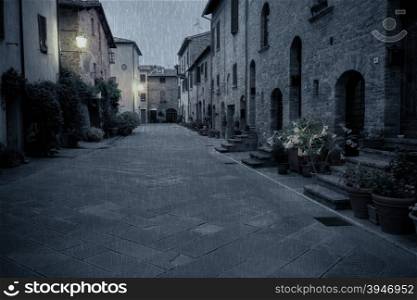 Old European street after dark. Pienza, Tuscany, Italy.