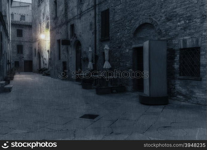 Old European street after dark. Pienza, Tuscany, Italy.