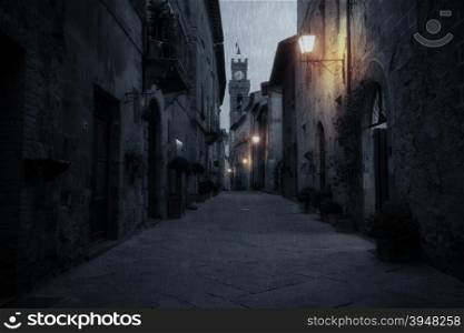 Old European street after dark. Pienza, Tuscany, Italy.