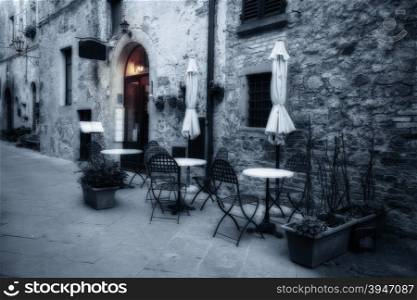 Old European town street at night. Pienza, Tuscany, Italy.
