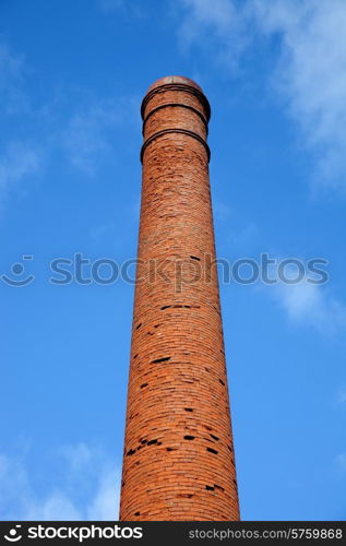 old factory chimney and the blue sky