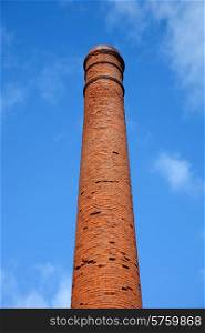 old factory chimney and the blue sky