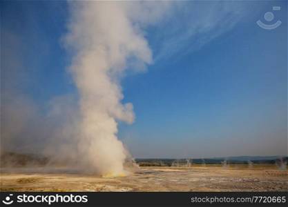 Old Faithful geyser eruption  in Yellowstone National Park, USA