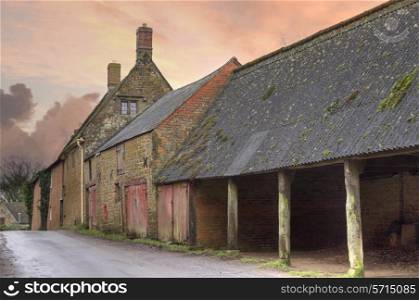 Old farm buildings at Winderton, Warwickshire, England.