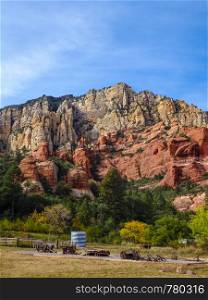 Old Farm Equipement with Red Rock Mountains in Slide Rock State Park outside Sedona Arizona
