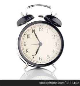Old fashioned alarm clock on white background.