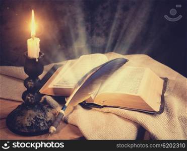 Old fashioned backgrounds with opened Holy Bible