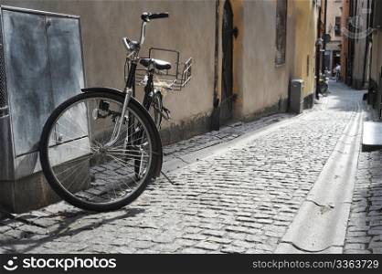Old fashioned bicycle on old Stockholm street