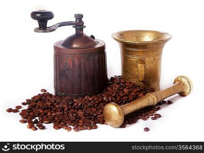Old-fashioned brazen coffee Grinder and roasted coffee beans - series of photos
