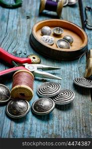 old-fashioned buttons and thread