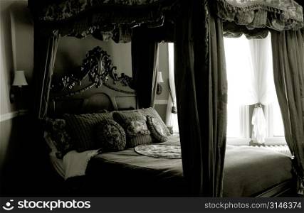 Old Fashioned Canopy Bed With Pillows