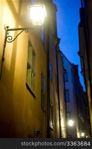 Old fashioned lantern on old Stockholm street ( Gamla Stan )