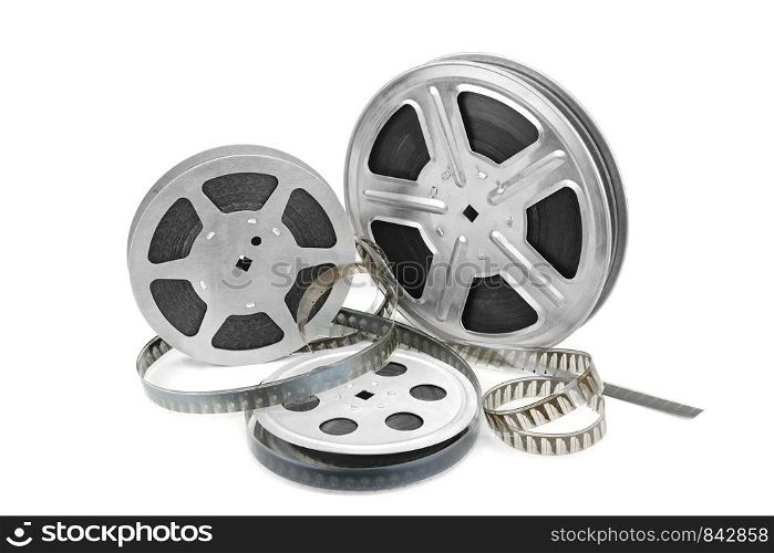 Old film in metal reels isolated on white background