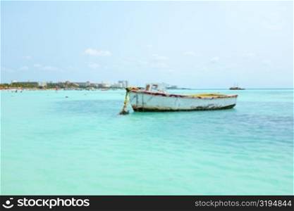 Old fisher&rsquo;s boat at Palm Beach in Aruba in the Carribean
