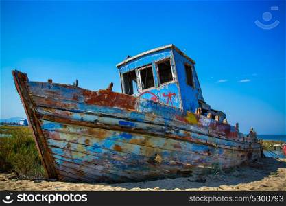 old fishing boat in calm water on comporta, alentejo Portugal.