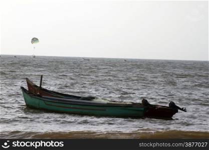 Old fishing boats at sea. India Goa.